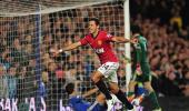 European soocer: United scrape through, Barca rout Rayo