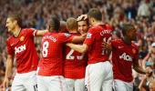 Photos: Van Persie hat-trick seals win for United