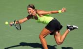 PHOTOS: Azarenka, Ferrer advance at rain-hit US Open