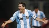 Magical Messi leads Argentina to top of World Cup table