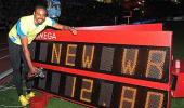 Merritt sets hurdles world record, Bolt, Blake win