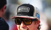 Title contender Raikkonen happy at Lotus, for now