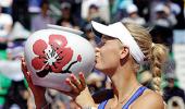 Wozniacki routs Kanepi to clinch year's first title