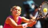 In-form Errani sends Bartoli packing in Tokyo