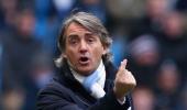 Mancini blasts lack of signings and United opponents