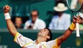 Djokovic battles through pain, Nadal finds it easy