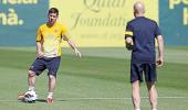 Barca's Messi returns to training camp