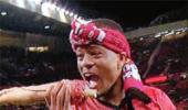 Evra pokes fun at Suarez, bites into fake arm