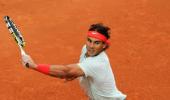 Nadal routs Raonic to close on eighth Barcelona title