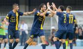 It's 'Hellas' for Milan after shocking loss at Verona; Tevez scores for Juve