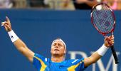 PHOTOS: Hewitt stuns Del Potro; Murray ovecomes hiccup