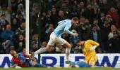 EPL: City go top with tough win over Palace