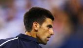 Djokovic in groove as Serbia lead Belgium in Davis Cup