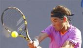 Nadal overcomes slow start to advance in Chile