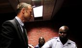 PHOTOS: Pistorius sobs as court hears murder charge