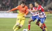 European Soccer Roundup: Barca, Bayern stay strong