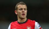 Wilshere says Arsenal must show Chelsea spirit