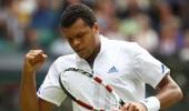 Tsonga saves five match points to knock out Tomic