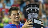 Tomic, Stosur carry Australian hopes in Melbourne