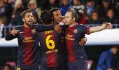 La Liga: Record for Barca as they march on at Malaga