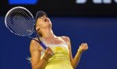 Photos:Sharapova eclipses Venus, Djokovic cruises