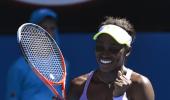 PHOTOS: Stephens stuns ailing Serena, Federer forges on