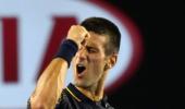 PHOTOS: Djokovic dominates after Azarenka controversy