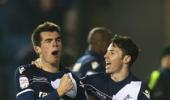 Slumping Villa knocked out of FA Cup by Millwall