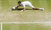 Plucky Djokovic tames Del Potro in epic semi-final