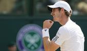 Murray lifts Wimbledon title, makes history