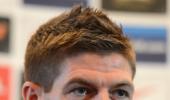 England captain Gerrard extends Liverpool love affair