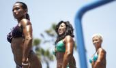 Muscle Beach bodybuilding has bikinis, spray tan, hair spray