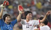 North Koreans get warm reception in South, win match