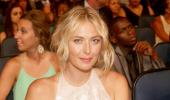 Tennis sensation Maria Sharapova towers over Hollywood actor