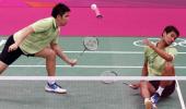 Former badminton doubles partners exchange blows on court