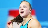 Lithuanian Meilutyte adds breaststroke gold to world record