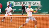 Paes-Melzer crash out of French Open