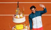 PHOTOS: Birthday boy Nadal reaches last eight in style