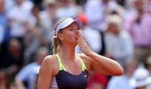 PHOTOS: Sharapova, Azarenka set up semi-final showdown