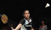 Saina in quarters at Singapore; Praneeth goes down fighting