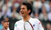 Federer handed shock second-round Wimbledon loss