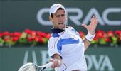 Djokovic, Federer lead top seeds into Dubai semis