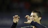 Ronaldo double lifts Real to second in La Liga