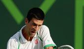 Djokovic breezes past Somdev at windy Miami