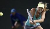 Sharapova powers through to Miami quarters