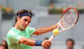 Mint-green Federer looking sharp on competitive return