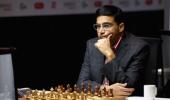 Anand crushes Topalov, moves to joint second