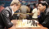 World chess: Anand plays out tame draw with white pieces against Carlsen