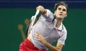 Djokovic canters as Federer makes winning return