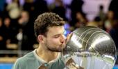 Dimitrov upsets Ferrer to win maiden tour title